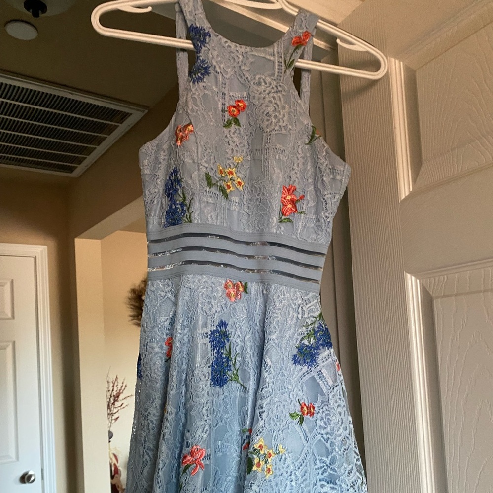 This dress is so stinking cute. I wore it only once, & it fits very snug. Sassy!